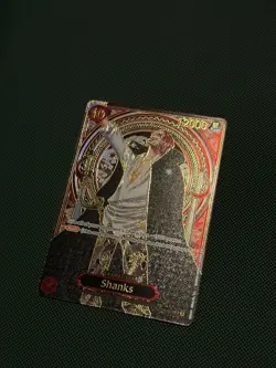 One Piece Carrying On His Will - OP13 - Shanks - OP09-004 (SP) (Gold) - English - Image 1