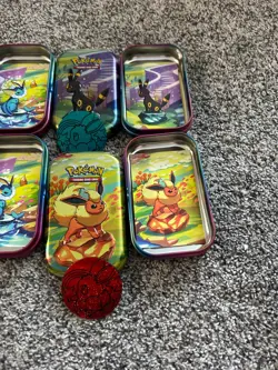 Pokemon Prismatic Evolutions Empty Mini Tins With Coins And Pictures - Image 2