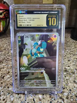 Pokemon: CGC 10 Pristine Japanese Golett 128/086 Art Rare From Black Bolt - Image 1