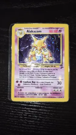 Pokemon TCG Base 2 Alakazam 1/130 Holo Rare Card 2000 WoTC HP/DMG Lamanated - Image 1
