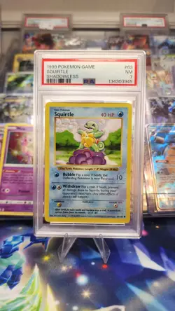 1999 Pokemon TCG Base Set Squirtle Card Shadowless, PSA 7 - Image 1