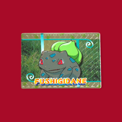 BULBASAUR (FUSHIGIDANE)--JAPANESE MEIJI EMBOSSED PROMO FOIL POKEMON CARD - Image 1