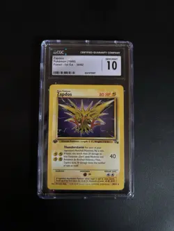 CGC 10 Zapdos 30/62 Rare 1st Edition Fossil Pokemon Card - Image 1
