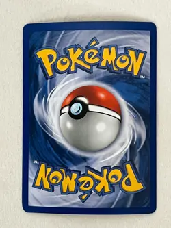 1999 Pokemon Charizard #4/130 Base Set 2 Holo Card - Image 2