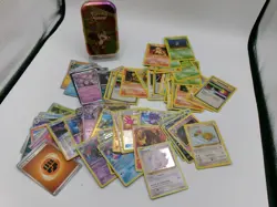 Large Bundle of Assorted Pokemon Cards with Collectible Tin - Mixed Set - Image 1