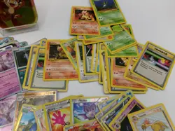 Large Bundle of Assorted Pokemon Cards with Collectible Tin - Mixed Set - Image 2