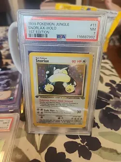 1999 Pokemon TCG Jungle 1st Edition Snorlax Holo Card PSA 7 - Image 1