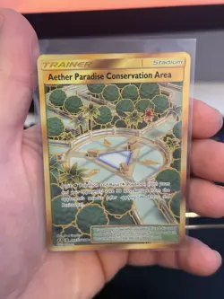 Aether Paradise Conservation Area Pokemon Gold Secret Rare Trainer SV87/SV94 - Image 1
