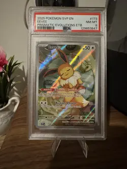 2025 POKEMON BLACK STAR PROMO EEVEE #173 PRISMATIC POKEMON CENTER ETB PSA 8 - Image 1