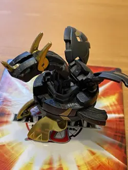 Bakugan Neo Dragonoid Bronze/Black Pyrus 650G New Vestroia - Excellent W/ Card! - Image 1
