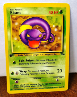 POKEMON EKANS 46/62 1ST EDITION FOSSIL LP - Image 1
