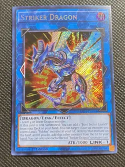 YuGiOh! - Striker Dragon RA01-EN046 Secret Rare 1st Edition Near Mint - Image 1