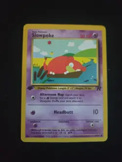 1st Edition Slowpoke 67/82 Team Rocket Pokemon Card - Image 1