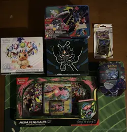 Sealed Pokemon Card Bundle- 2 ETB- 1 Mega Metal Tin- 1 Mega Venusaur Box & More - Image 1