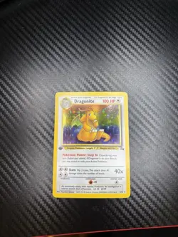 1999 Pokemon TCG Dragonite Fossil 1st Edition Holo Card 4/62 NM Condition - Image 1