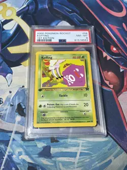 2000 Pokemon 1st Edition Rocket #58 Koffing PSA 8 - Image 1