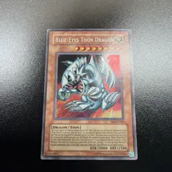 Blue-Eyes Toon Dragon SRL-EN000 Unlimited NM - Image 1