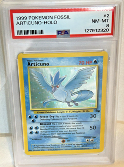 1999 Pokemon Fossil Articuno Holo PSA 8 - Image 1