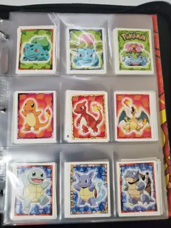 Pokemon Topps Merlin Series 1 Complete Set Plus Sticker Album, 10 Sealed Packs - Image 1