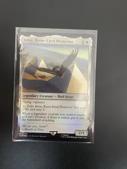 MTG Senu, Keen-Eyed Protector (Foil) [Assassin's Creed, Near Mint] - Image 1