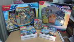 POKEMON PRISMATIC POSTER + KANGASKHAN BOX + MEGA + SURGING + STELLAR BUNDLE BOX - Image 1