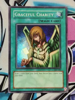 YUGIOH Graceful Charity Creases UNLIMITED EDITION Super Rare SDP-040 - Image 1