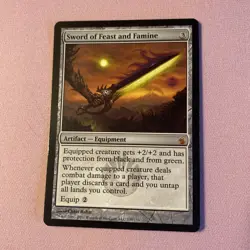 Sword of Feast and Famine Mirrodin Besieged Regular - Image 1