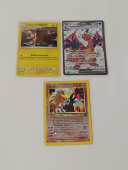 Pokemon Entei Promo Reverse Holo/Charizard Promo/Detective Pikachu Promo Cards - Image 1