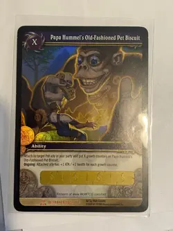 World of Warcraft TCG Unscratched Papa Hummel's Old-Fashioned Pet Biscuit Card - Image 1