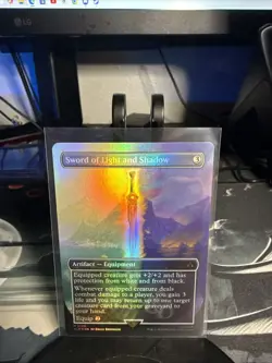 Sword of Light and Shadow (Borderless) Universes Beyond: Assassin's Creed Foil - Image 1