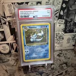 [PSA 7] Vaporeon Holo 12/64 1st Edition Jungle 1999 Pokemon Card - Image 1