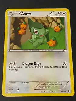 2011 Pokemon TCG Axew BW16 Mystery Egg Black Star Promo - Image 1