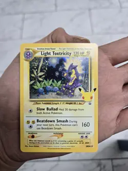 POKEMON CELEBRATIONS LIGHT TOXTRICITY COSMOS HOLO SWSH137 - Image 1
