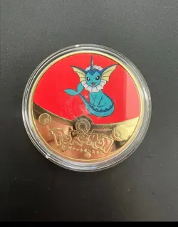 POKEMON GOLD PLATED COLLECTIBLE COIN VAPOREON EEVEELUTION - Image 1