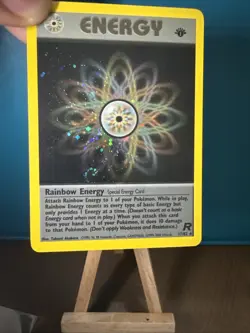 2000 Pokemon Team Rocket 1st Edition #17/82 Rainbow Energy Holo NM with SWIRL - Image 3