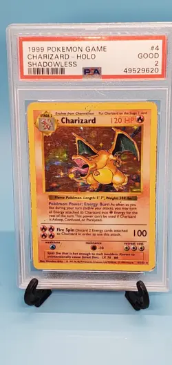 1999 POKEMON BASE SET SHADOWLESS #4 CHARIZARD-HOLO PSA 2 - Image 1