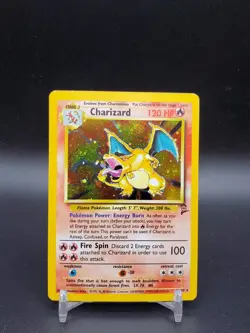 Charizard 4/130 Base Set 2 Holo DMG Pokemon Card - Image 1