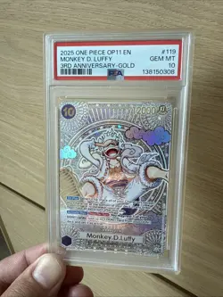 2025 ONE PIECE OP11-A FIST OF DIVINE SPEED 3RD ANV-GOLD MONKEY D. LUFFY PSA 10 - Image 1
