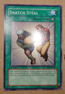 SD4-EN015 Snatch Steal Common 1st Edition Yugioh Card - Image 1