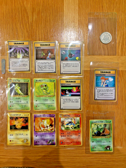 11 Japanese Pokemon TCG Pocket Monsters 1996: Pikachu Y-2000 Coin. Two 98’ VHS - Image 1