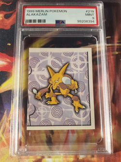 Pokemon 1999 Alakazam #219 Merlin Sticker PSA 9 Mint - Image 1