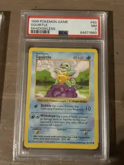 Pokemon TCG Squirtle Card 63/102 Shadowless PSA 7 1999 - Image 1