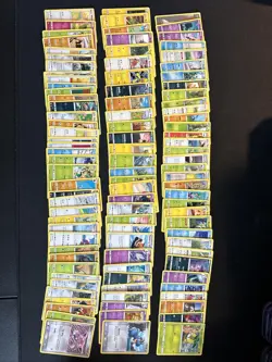 100+ Pokemon Card Lot W/ Darkrai Tin, Coins, Dice - Image 3