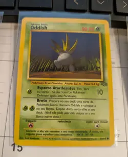 1999 Jungle 58/64 Oddish Pokemon Portuguese - Image 1