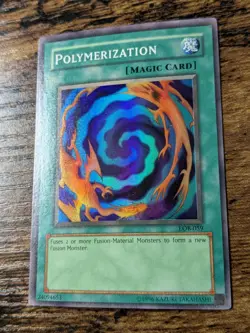 YU-GI-OH POLYMERIZATION LOB-059 UNLIMITED SUPER RARE LP - Image 1