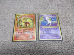 Pocket Monsters Lot Of 2 Vintage Trading Cards Mew - Image 1