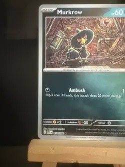 Murkrow 057/094 Me02: Phantasmal Flames Reverse Holo Common Pokemon TCG Card - Image 2