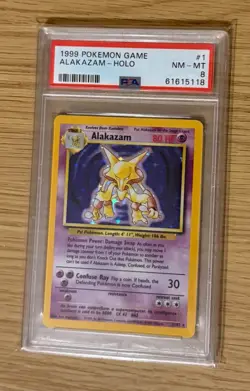 1999 POKEMON BASE SET UNLIMITED #1 ALAKAZAM-HOLO PSA 8 - Image 1