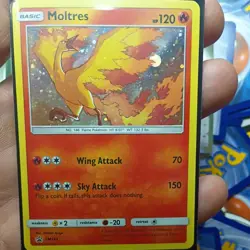 Pokemon TCG. Moltres SM143 Sun & Moon Black Star Promo Cosmos Holo (NEAR... - Image 3