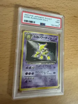 1997 Pocket Pokemon Japanese Rocket Dark Alakazam Holo #65 PSA 9 MINT Swirl - Image 1